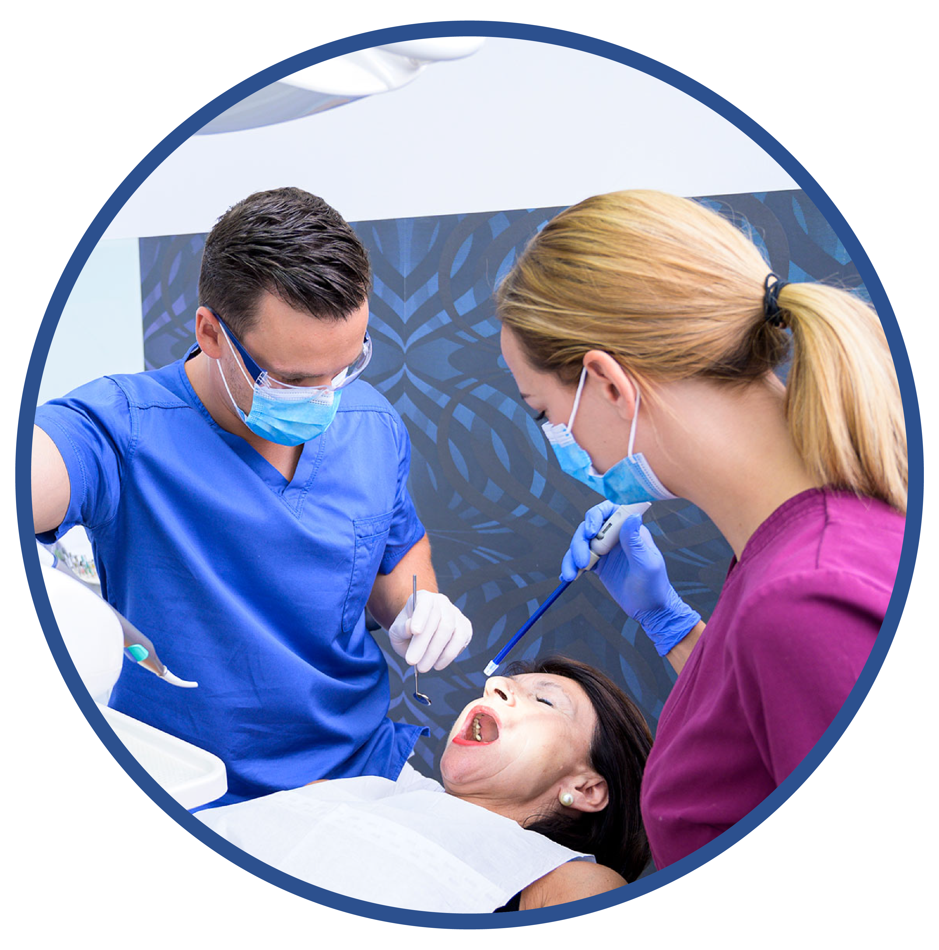 two dentist examining a patient